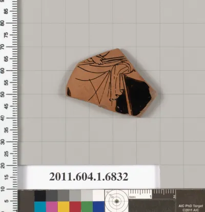 Terracotta fragment of a kylix (drinking cup)
