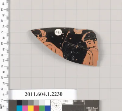 Terracotta rim fragment of a kylix (drinking cup)