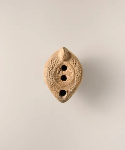 Terracotta oil lamp