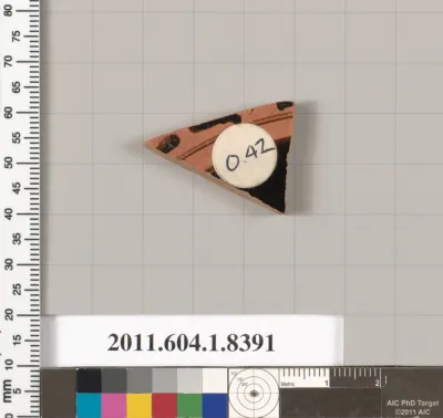 Terracotta fragment of a kylix (drinking cup)