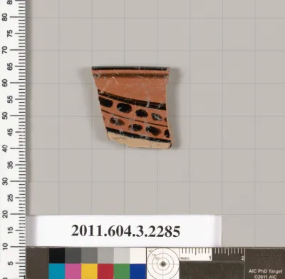 Terracotta rim fragment of a kylix: eye-cup (drinking cup)