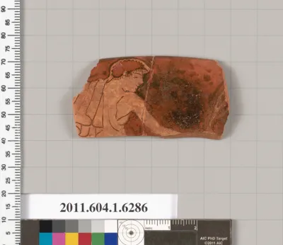Terracotta rim fragment of a kylix (drinking cup)
