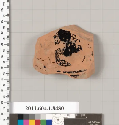 Terracotta fragment of a stemless kylix (drinking cup)