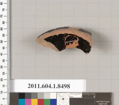 Terracotta fragment of a stemless kylix (drinking cup)