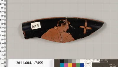 Terracotta fragment of a kylix (drinking cup)