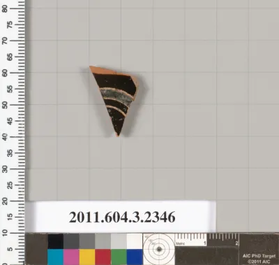 Terracotta fragment of a kylix: eye-cup (drinking cup)
