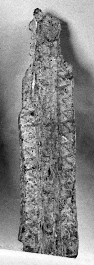 Dreifußbein, auf der Vorderseite Tangentenkreise und Zickzack-Muster