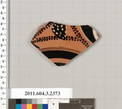 Terracotta fragment of a kylix: eye-cup (drinking cup)