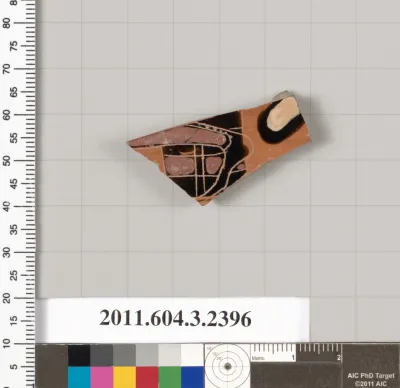 Terracotta fragment of a kylix: eye-cup (drinking cup)