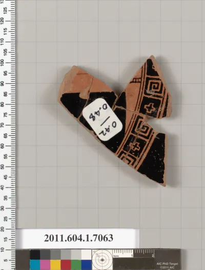 Terracotta fragment of a kylix (drinking cup)