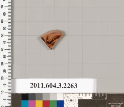 Terracotta fragment of a kylix (drinking cup)