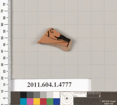 Terracotta fragment of a kylix (drinking cup)