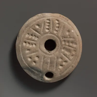 Terracotta oil lamp
