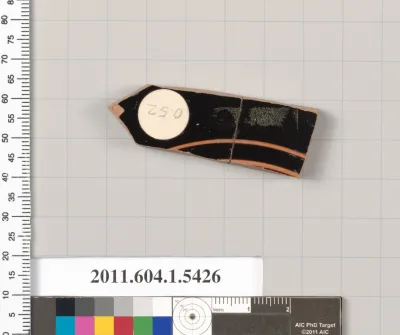 Terracotta fragment of a kylix (drinking cup)