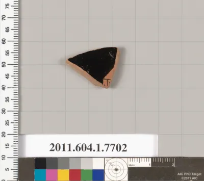 Terracotta fragment of a kylix (drinking cup)