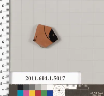 Terracotta fragment of a kylix (drinking cup)