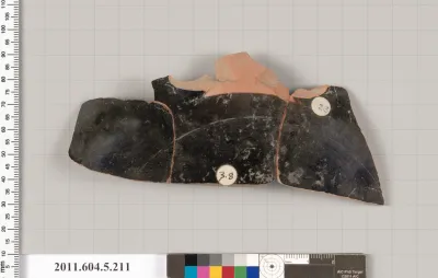 Terracotta fragment of a kylix (drinking cup)