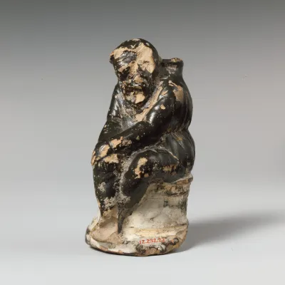 Terracotta guttus (flask with handle and vertical spout)