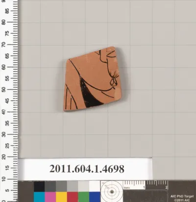 Terracotta fragment of a kylix (drinking cup)