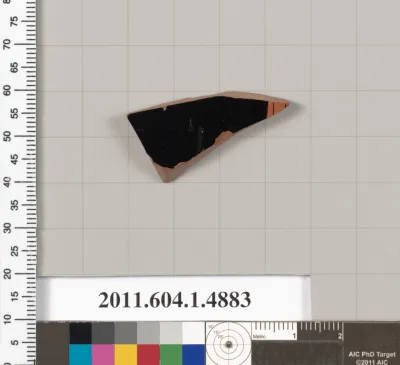 Terracotta fragment of a kylix (drinking cup)