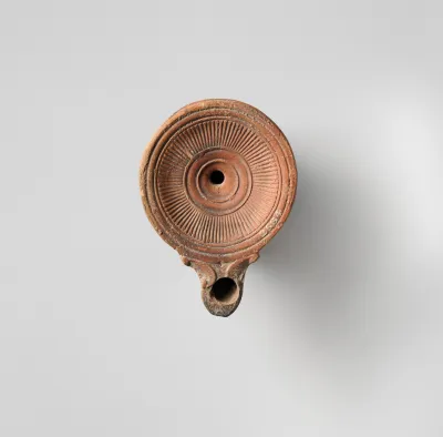 Terracotta oil lamp