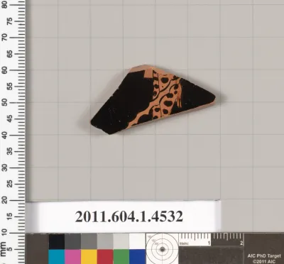 Terracotta fragment of a kylix (drinking cup)