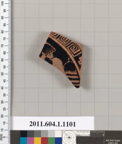 Terracotta fragment of a kylix (drinking cup)