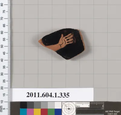 Terracotta fragment of a kylix (drinking cup)