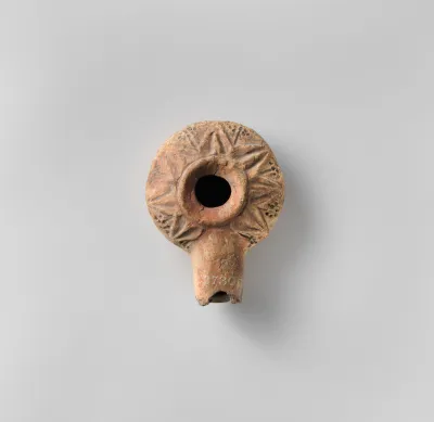 Terracotta oil lamp