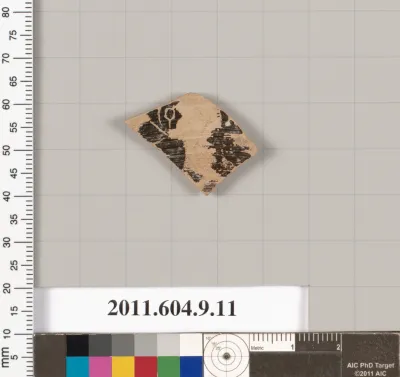 Terracotta fragment of a kylix (drinking cup)