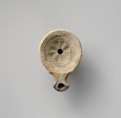 Terracotta oil lamp