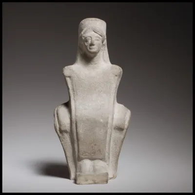 Seated female figurine