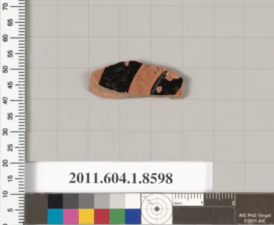 Terracotta fragment of a stemless kylix (drinking cup)