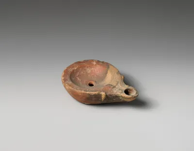 Terracotta oil lamp