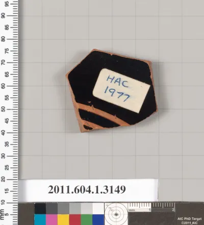 Terracotta fragment of a kylix (drinking cup)