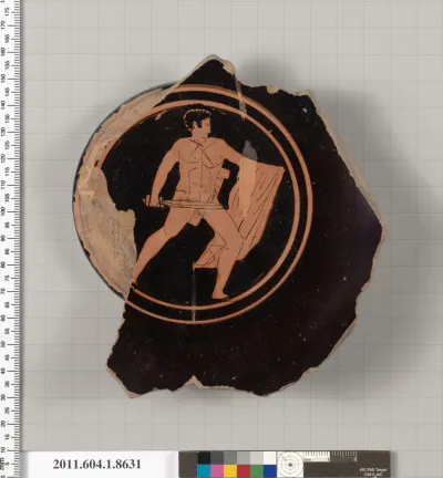 Terracotta fragment of a stemless kylix (drinking cup)