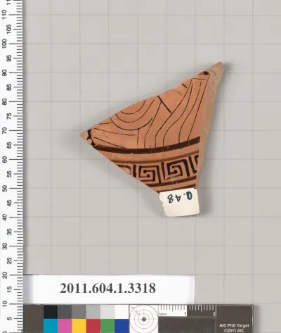 Terracotta fragment of a kylix (drinking cup)