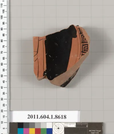 Terracotta fragment of a stemless kylix (drinking cup)