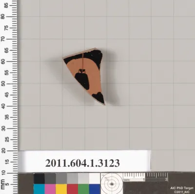 Terracotta fragment of a kylix (drinking cup)