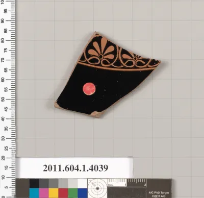 Terracotta fragment of a kylix (drinking cup)