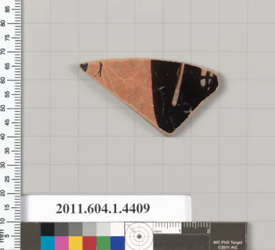 Terracotta fragment of a kylix (drinking cup)
