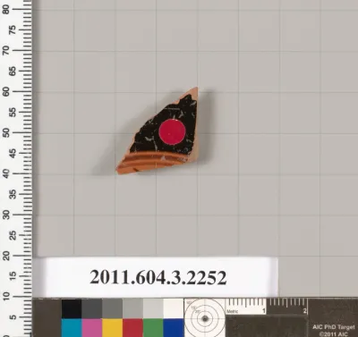 Terracotta fragment of a kylix (drinking cup)