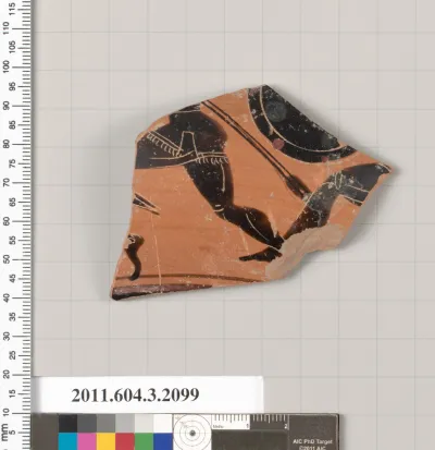 Terracotta fragment of a kylix (drinking cup)