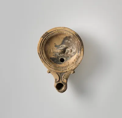 Terracotta oil lamp