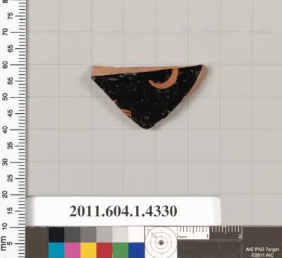 Terracotta fragment of a kylix (drinking cup)