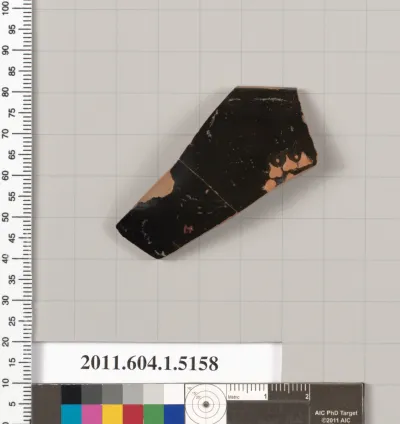 Terracotta rim fragment of a kylix (drinking cup)