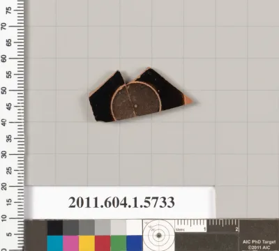 Terracotta fragment of a kylix: eye-cup  (drinking cup)