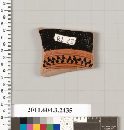 Terracotta fragment of a kylix (drinking cup)