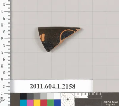 Terracotta rim fragment of a kylix (drinking cup)
