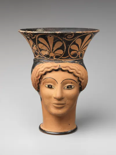 Terracotta mug in the form of a woman's head